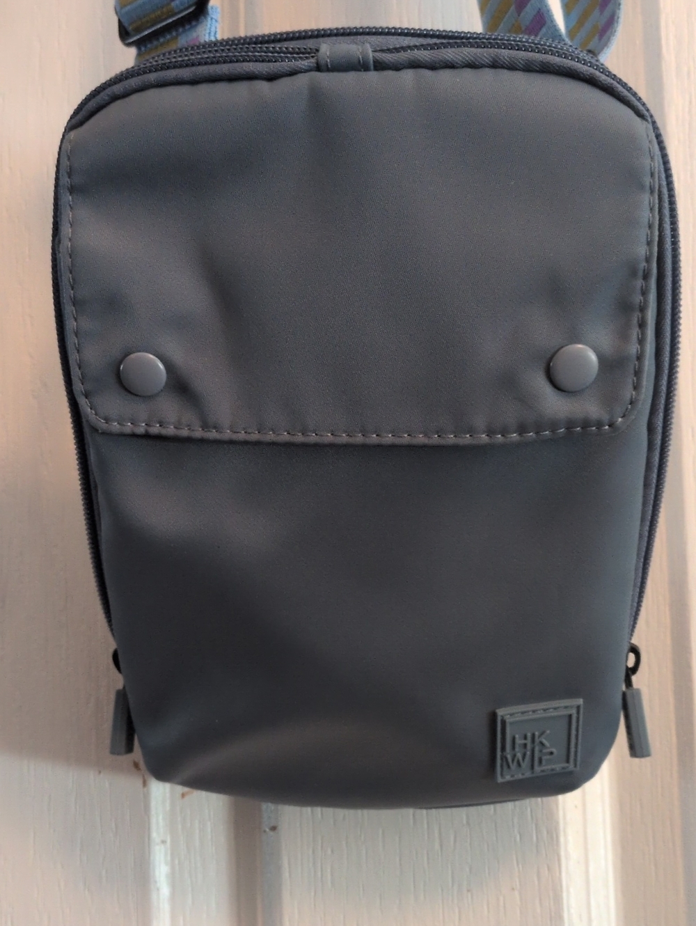 Compact Blue Crossbody Bag with Front Snap Pocket